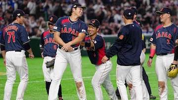 Japan's Shohei Ohtani (C) celebrates Japan's victory with his teammates during the World Baseball Classic (WBC) Pool C first-round game between Japan and Taiwan at the Tokyo Dome on March 6, 2026. (Photo by Yuichi YAMAZAKI / AFP)
