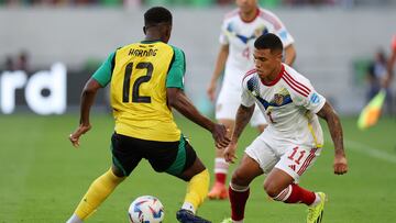 AUSTIN, TEXAS - JUNE 30: Darwin Machis of Venezuela and Wesley Harding of Jamaica battle for the ball during the CONMEBOL Copa America 2024 Group B match between Jamaica and Venezuela at Q2 Stadium on June 30, 2024 in Austin, Texas.   Buda Mendes/Getty Images/AFP (Photo by Buda Mendes / GETTY IMAGES NORTH AMERICA / Getty Images via AFP)