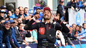 Spain&#039;s Jordi Gamito celebrates as he crosses the finish line to place third in the 170 km Mount Blanc Ultra Trail (UTMB) race around the Mont-Blanc crossing France, Italy and Switzerland, on September 1, 2018 in Chamonix Mont-Blanc. (Photo by JEAN-PIERRE CLATOT / AFP)