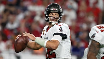 Jan 9, 2022; Tampa, Florida, USA; Tampa Bay Buccaneers quarterback Tom Brady (12) throws the ball against the Carolina Panthers during the second half at Raymond James Stadium. Mandatory Credit: Kim Klement-USA TODAY Sports