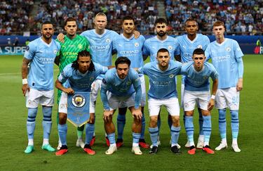 Once del Mancehster City. De pie; Kyle Walker, Ederson Moraes, Erling Haaland, Rodrigo Hernández, Joško Gvardiol, Manuel Akanji y Cole Palmer. Agachados; NathanAké, Jack Grealish, Mateo Kovacic y Phil Foden.