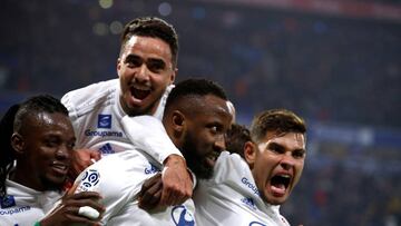 FILE PHOTO: Soccer Football - Ligue 1 - Olympique Lyonnais v AS Saint-Etienne - Groupama Stadium, Lyon, France - March 1, 2020  Olympique Lyonnais&#039; Moussa Dembele celebrates scoring their second goal with teammates    REUTERS/Pascal Rossignol/File Ph