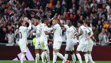 Real Madrid's Brazilian forward #07 Vinicius Junior (3R) celebrates scoring his team's second goal during the Spanish league football match between Real Madrid CF and Rayo Vallecano de Madrid at the Santiago Bernabeu stadium in Madrid on March 9, 2025. (Photo by Thomas COEX / AFP)