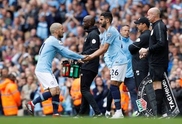 David Silva appears with his son ahead of Manchester City's first home game of the season