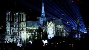 General view of the Notre-Dame de Paris Cathedral, five-and-a-half years after a fire ravaged the Gothic masterpiece, during a light show for its reopening service ceremony as part of ceremonies to mark the Cathedral's reopening after its restoration, in Paris, France, December 7, 2024. REUTERS/Christian Hartmann