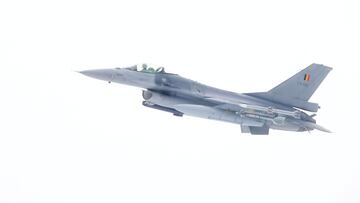 FILE PHOTO: Belgium Air Force F-16 fighter flies over the Amari military airfield, Estonia February 1, 2022. REUTERS/Ints Kalnins/File Photo