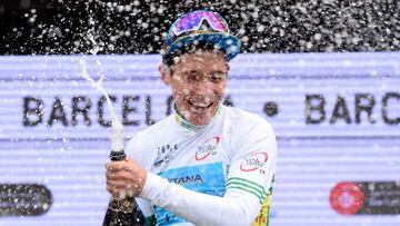 AstanaxB4s Colombian Miguel Angel Lopez overall leader celebrates next after winning the 99th Volta Catalunya 2019 on March 31, 2019 in Barcelona. (Photo by Josep LAGO / AFP)