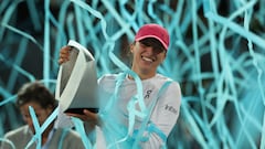 Poland's Iga Swiatek holds her trophy after beating Belarus' Aryna Sabalenka during the 2024 WTA Tour Madrid Open tournament final tennis match at Caja Magica in Madrid on May 4, 2024. (Photo by Pierre-Philippe MARCOU / AFP)
