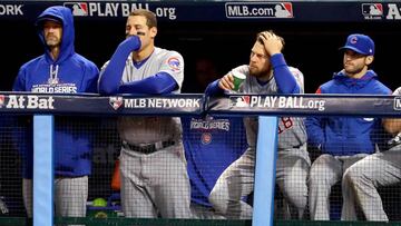 CLEVELAND, OH - OCTOBER 25: David Ross #3, Anthony Rizzo #44 and Anthony Rizzo #44 of the Chicago Cubs react in the eighth inning while taking on the Cleveland Indians in Game One of the 2016 World Series at Progressive Field on October 25, 2016 in Cleveland, Ohio.   Jamie Squire/Getty Images/AFP
 == FOR NEWSPAPERS, INTERNET, TELCOS &amp; TELEVISION USE ONLY ==