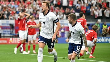 England's forward #09 Harry Kane celebrates scoring his team's first goal next to England's defender #12 Kieran Trippier (R) during the UEFA Euro 2024 Group C football match between Denmark and England at the Frankfurt Arena in Frankfurt am Main on June 20, 2024. (Photo by JAVIER SORIANO / AFP)