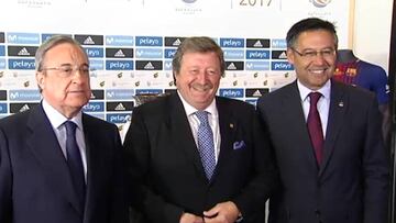 Cara de pocos amigos de Florentino en la foto con el trofeo