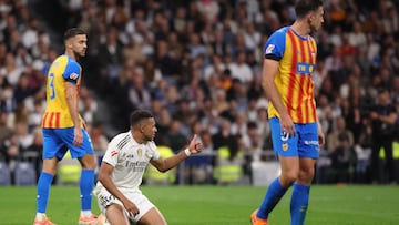 Real Madrid's French forward #10 Kylian Mbappe gives a thumbs-up during the Spanish League football match between Real Madrid CF and Valencia CF at Santiago Bernabeu Stadium in Madrid on November 1, 2025. (Photo by Oscar DEL POZO / AFP)