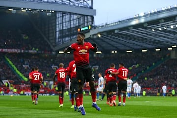 Paul Pogba celebrates his opener against Brighton & Hove Albion at Old Trafford.