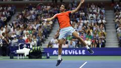 NEW YORK, NEW YORK - SEPTEMBER 11: Carlos Alcaraz of Spain plays a backhand volley against Casper Ruud of Norway during their Men�s Singles Final match on Day Fourteen of the 2022 US Open at USTA Billie Jean King National Tennis Center on September 11, 2022 in the Flushing neighborhood of the Queens borough of New York City.   Julian Finney/Getty Images/AFP