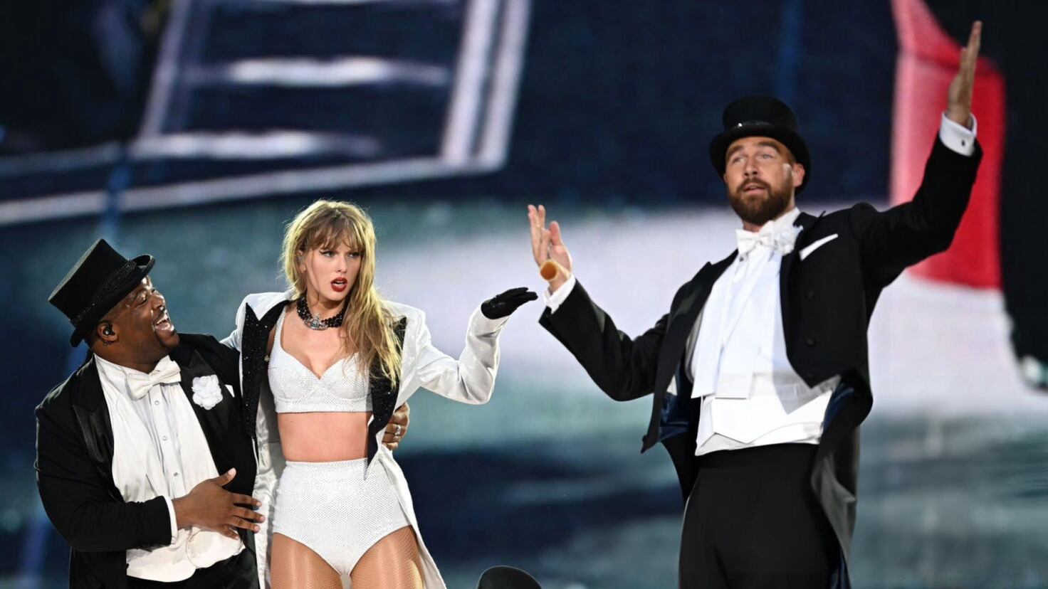 Whose idea was Travis Kelce’s stage appearance at the Taylor Swift concert?