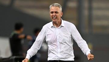 Peru's Sporting Cristal Brazilian coach Tiago Nunes celebrates during the second leg Copa Libertadores second stage football match between Peru's Sporting Cristal and Paraguay's Nacional, at the National stadium in Lima, on February 28, 2023. (Photo by ERNESTO BENAVIDES / AFP)