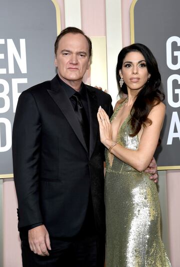 Quentin Tarantino y Daniella Pick en la alfombra roja.