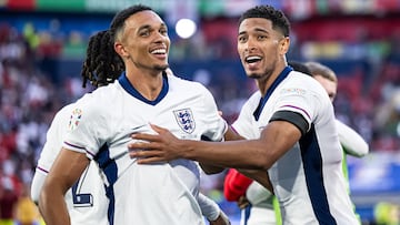 DUSSELDORF, GERMANY - JULY 06: Trent Alexander-Arnold of England celebrates victory with Jude Bellingham of England (R) after the UEFA EURO 2024 quarter-final match between England and Switzerland at Düsseldorf Arena on July 06, 2024 in Dusseldorf, Germany. (Photo by Marvin Ibo Guengoer - GES Sportfoto/Getty Images)