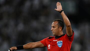 Argentine referee Dario Herrera gestures during the Copa Sudamericana group stage first leg football match between Brazil's Botafogo and Ecuador's Liga de Quito, at the Nilton Santos stadium in Rio de Janeiro, Brazil, on May 4, 2023. (Photo by MAURO PIMENTEL / AFP)