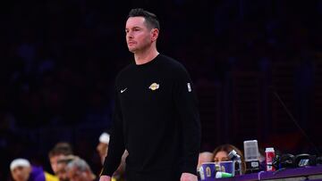 Dec 28, 2024; Los Angeles, California, USA; Los Angeles Lakers head coach JJ Redick watches game action against the Sacramento Kings during the first half at Crypto.com Arena. Mandatory Credit: Gary A. Vasquez-Imagn Images