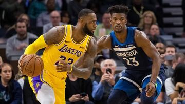 Oct 29, 2018; Minneapolis, MN, USA; Los Angeles Lakers forward LeBron James (23) dribbles in the fourth quarter against Minnesota Timberwolves guard Jimmy Butler (23) at Target Center. Mandatory Credit: Brad Rempel-USA TODAY Sports
