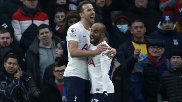 Tottenham Hotspur's English striker Harry Kane (L) celebrates with Tottenham Hotspur's Brazilian midfielder Lucas Moura (R) after scoring the opening goal of the English Premier League football match between Tottenham Hotspur and Crystal Palace