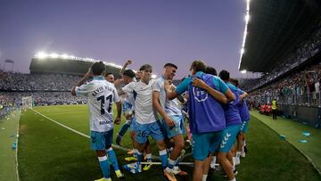 Los jugadores del Málaga, celebrando el 2-1 al Nàstic.