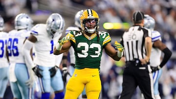 ARLINGTON, TEXAS - JANUARY 14: Aaron Jones #33 of the Green Bay Packers reacts to a first down against the Dallas Cowboys in the first quarter of the NFC Wild Card Playoff game at AT&T Stadium on January 14, 2024 in Arlington, Texas. Ron Jenkins/Getty Images/AFP (Photo by Ron Jenkins / GETTY IMAGES NORTH AMERICA / Getty Images via AFP)
