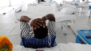 A COVID-19 patient reacts after being tested inside a field hospital built&Ecirc;on a soccer stadium in Machakos, as the number of confirmed coronavirus disease (COVID-19) cases continues to rise in Kenya, July 23, 2020. Picture taken July 23, 2020.REUTER