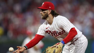 Oct 3, 2023; Philadelphia, Pennsylvania, USA; Philadelphia Phillies designated hitter Bryce Harper (3) throws the ball to first base for the out against the Miami Marlins in the sixth inning for game one of the Wildcard series for the 2023 MLB playoffs at Citizens Bank Park. Mandatory Credit: Bill Streicher-USA TODAY Sports