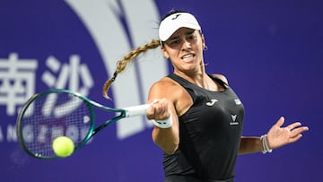 Spain's Jessica Bouzas Maneiro hits a return to USA's Caroline Dolehide during their women's singles quarterfinal match at the Guangzhou Open tennis tournament in Guangzhou, China's southern Guangdong province on October 25, 2024. (Photo by AFP)