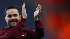 Barcelona's Spanish coach Jonatan Giraldez applauds at the end of the UEFA Women's Champions League semi-final second leg football match between Chelsea and Barcelona at Stamford Bridge, in London, on April 27, 2024. Holders Barcelona booked their place in the Women's Champions League final with a controversial 2-0 win against Chelsea in the semi-final second leg. (Photo by Adrian DENNIS / AFP)