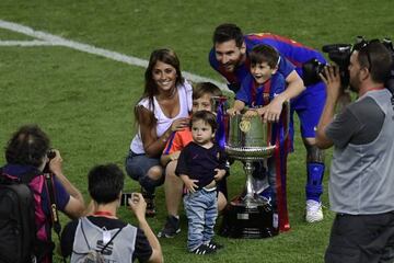 Barcelona's Argentinian forward Lionel Messi with family and the 2017 Spanish Copa del Rey.