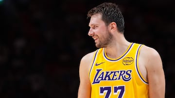 MIAMI, FLORIDA - MARCH 19: Luka Doncic #77 of the Los Angeles Lakers looks on against the Miami Heat during the fourth quarter at Kaseya Center on March 19, 2026 in Miami, Florida. NOTE TO USER: User expressly acknowledges and agrees that, by downloading and or using this photograph, User is consenting to the terms and conditions of the Getty Images License Agreement. Rich Storry/Getty Images/AFP (Photo by Rich Storry / GETTY IMAGES NORTH AMERICA / Getty Images via AFP)