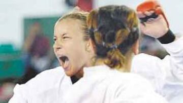 <b>PELEA DE ORO. </b>La catalana Cristina Feo consiguió el primer oro femenino español en los Juegos.