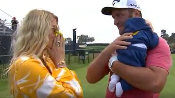 Detrás del héroe, la imagen más entrañable: Rahm con su mujer e hijo tras tocar la gloria