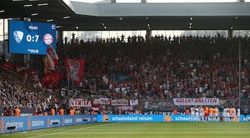 Soccer Football - Bundesliga - VfL Bochum v Bayern Munich - Ruhrstadion, Bochum, Germany - August 21, 2022 General view of the scoreboard as Bayern Munich players celebrate the match REUTERS/Thilo Schmuelgen DFL REGULATIONS PROHIBIT ANY USE OF PHOTOGRAPHS AS IMAGE SEQUENCES AND/OR QUASI-VIDEO.  REFILE - CORRECTING STADIUM NAME