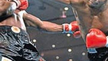<b>CONTRA TYSON. </b>Berbick (izquierda) cedió el título ante Tyson.
