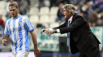 Demichelis en su etapa de jugador junto a Pellegrini. 