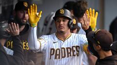 Jul 5, 2023; San Diego, California, USA; San Diego Padres third baseman Manny Machado (13) is congratulated in the dugout after hitting a home run against the Los Angeles Angels during the sixth inning at Petco Park. Mandatory Credit: Orlando Ramirez-USA TODAY Sports