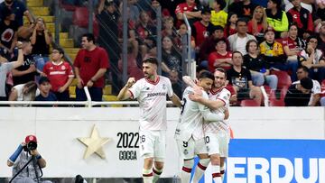 Toluca's Portuguese forward #26 Paulinho (L) celebrates next to teammates forward #09 Alexis Vega and midfielder #10 Jesus Angulo after scoring his team's third goal during the Liga MX Clausura football match between Atlas and Toluca at the Jalisco Stadium in Guadalajara, Jalisco state, Mexico on April 12, 2025. (Photo by Ulises Ruiz / AFP)