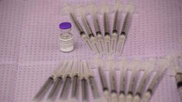 Doses of the Pfizer Covid-19 vaccine await to be administered after it was approved for use by the FDA in children 12 and over at a Los Angeles County mobile vaccination clinic on May 14, 2021 in Los Angeles, California. (Photo by Patrick T. FALLON / AFP)