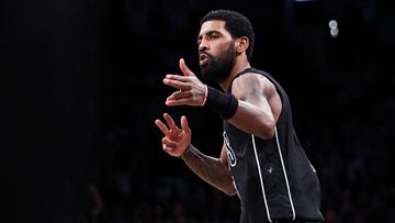 NEW YORK, NEW YORK - DECEMBER 23: Kyrie Irving #11 of the Brooklyn Nets reacts after making a three pointer during the fourth quarter of the game against the Milwaukee Bucks at Barclays Center on December 23, 2022 in New York City. NOTE TO USER: User expressly acknowledges and agrees that, by downloading and or using this photograph, User is consenting to the terms and conditions of the Getty Images License Agreement. Dustin Satloff/Getty Images/AFP (Photo by Dustin Satloff / GETTY IMAGES NORTH AMERICA / Getty Images via AFP)