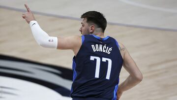 DALLAS, TEXAS - APRIL 21: Luka Doncic #77 of the Dallas Mavericks reacts after scoring against the Detroit Pistons in the first quarter at American Airlines Center on April 21, 2021 in Dallas, Texas. NOTE TO USER: User expressly acknowledges and agrees that, by downloading and or using this photograph, User is consenting to the terms and conditions of the Getty Images License Agreement. Tom Pennington/Getty Images/AFP
== FOR NEWSPAPERS, INTERNET, TELCOS & TELEVISION USE ONLY ==