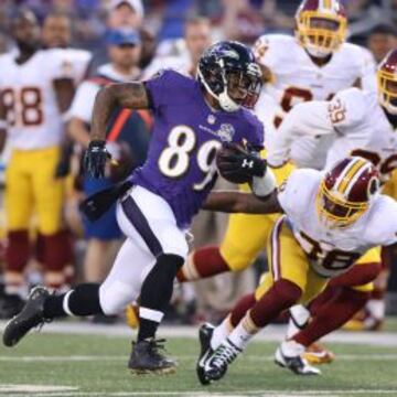 Aug 29, 2015; Baltimore, MD, USA; Baltimore Ravens wide receiver Steve Smith (89) scores a touchdown past Washington Redskins safety Dashon Goldson (38) at M&T Bank Stadium. Mandatory Credit: Mitch Stringer-USA TODAY Sports