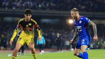 Kevin Alvarez (L) of America fights for the ball with Carlos Rotondi (R) of Cruz Azul during the 13th round match between Cruz Azul and America as part of the Liga BBVA MX, Torneo Apertura 2025 at Olimpico Universitario Stadium, on October 18, 2025 in Mexico City, Mexico.