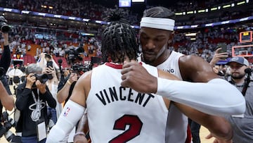 MIAMI, FLORIDA - MAY 17: Jimmy Butler #22 of the Miami Heat hugs teammate Gabe Vincent #2 after defeating the Boston Celtics in Game One of the 2022 NBA Playoffs Eastern Conference Finals at FTX Arena on May 17, 2022 in Miami, Florida. NOTE TO USER: User expressly acknowledges and agrees that, by downloading and or using this photograph, User is consenting to the terms and conditions of the Getty Images License Agreement.   Michael Reaves/Getty Images/AFP
 == FOR NEWSPAPERS, INTERNET, TELCOS &amp; TELEVISION USE ONLY ==