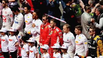SHANGHAI, CHINA - APRIL 15: A general view of the drivers lined up for the national anthem on the grid before the Formula One Grand Prix of China at Shanghai International Circuit on April 15, 2018 in Shanghai, China. (Photo by Charles Coates/Getty Images)