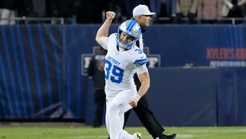 Jan 4, 2026; Chicago, Illinois, USA; Detroit Lions place kicker Jake Bates (39) celebrates after making the game-winning field goal against the Chicago Bears during the second half at Soldier Field. Mandatory Credit: David Banks-Imagn Images