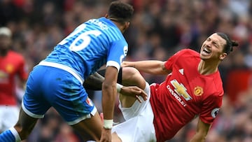 Rooney demands action against Mings after Ibrahimovic 'stamp'